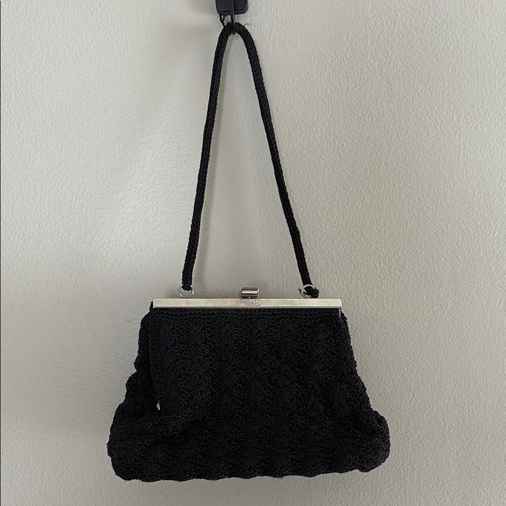The Sak Black Mini Bag with Textured Fabric and Metal Frame